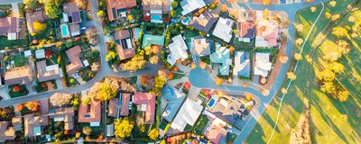 Queensland’s controversial land tax regime has been shelved cover